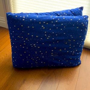 Blue body pillow with stars. Great for naps or lounging .  Good condition